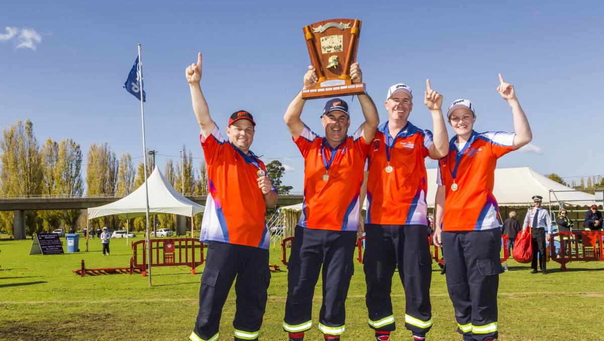 Bega team lift up the trophy after winning the regional firefighting championship in 2017. Picture by Robert Hayson Photography