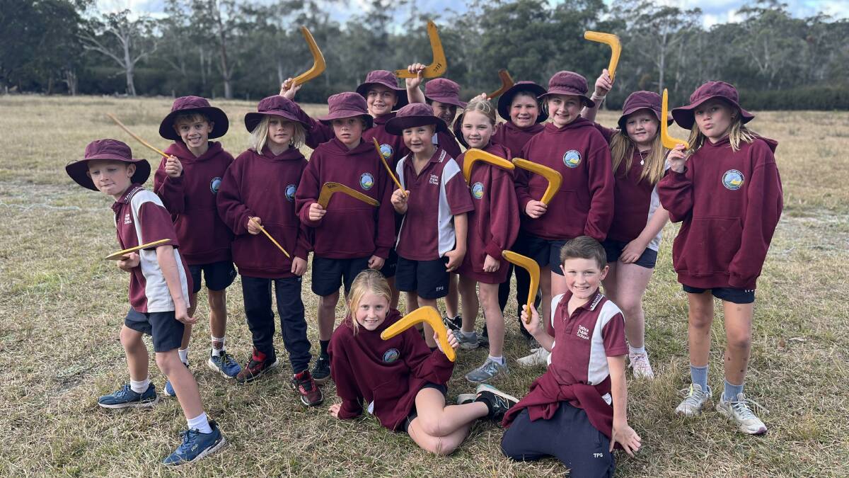 Tathra Public School students with boomerangs during the NAIDOC event at Jigamy Farm. Picture by Jimmy Parker