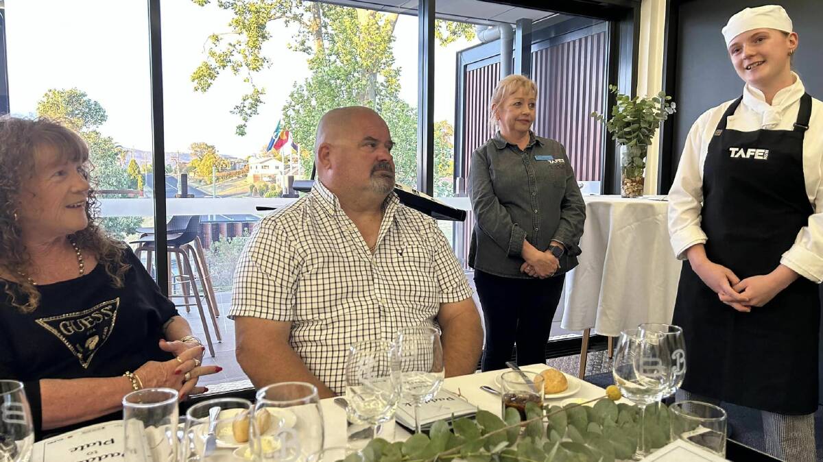 Lilli Britton shares her experiences in the Tasting Success program as proud parents Mel and Dave and head teacher Deirdre Jory watch on. Picture supplied