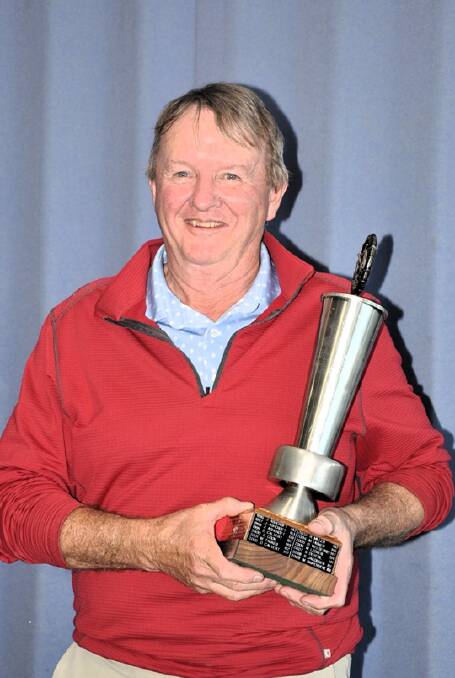 Gary Cook with the Tura Beach Open Championship Trophy. Picture supplied