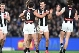 Led by Nick Daicos (C), Collingwood have come back from 54 points down to beat North by a point. (Joel Carrett/AAP PHOTOS)